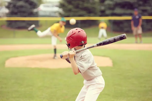 Why did the Little League® player run to the park during his time at bat?