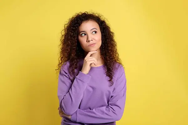 What has 12 legs, six eyes, three tails and can't see?